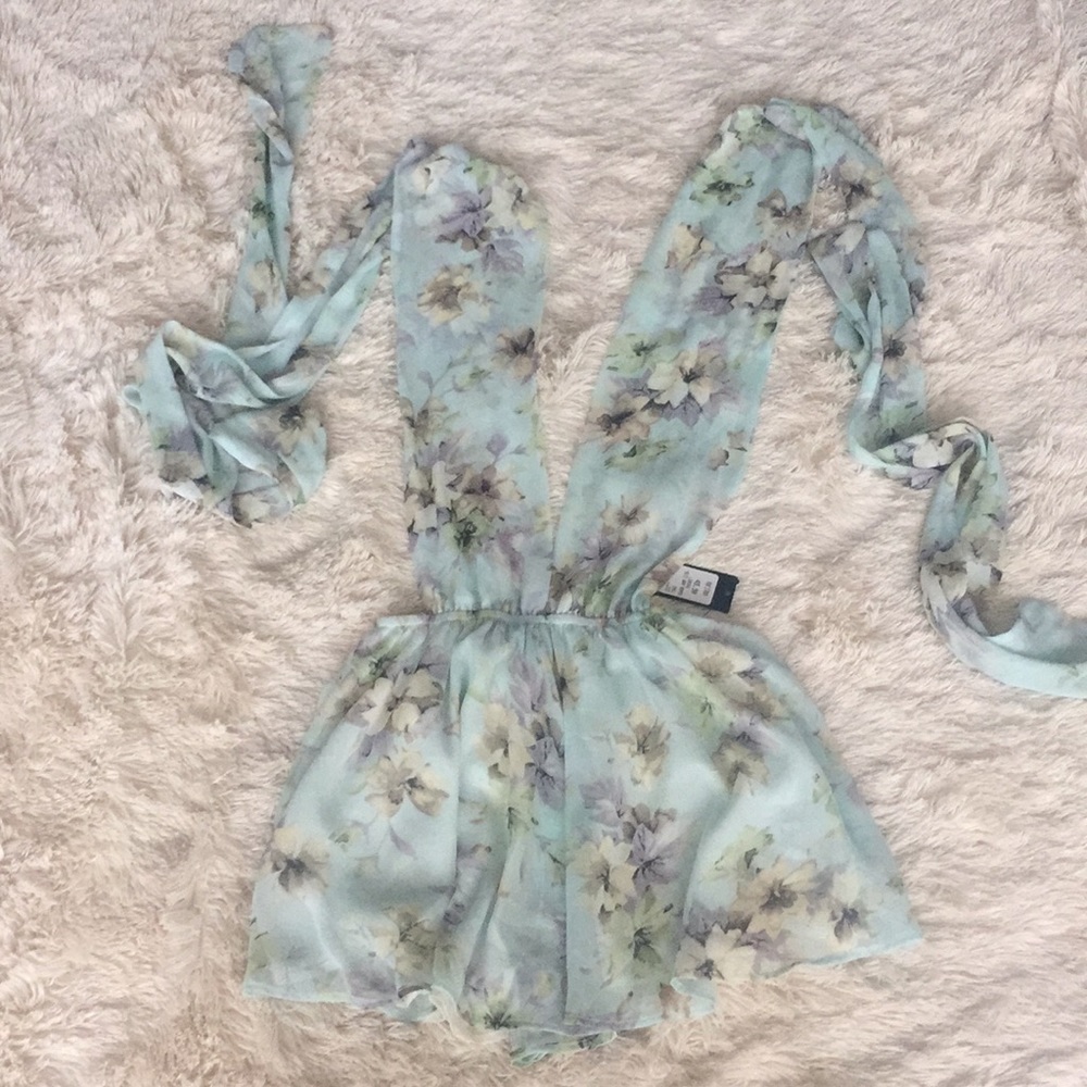 Akira multi wrap romper
